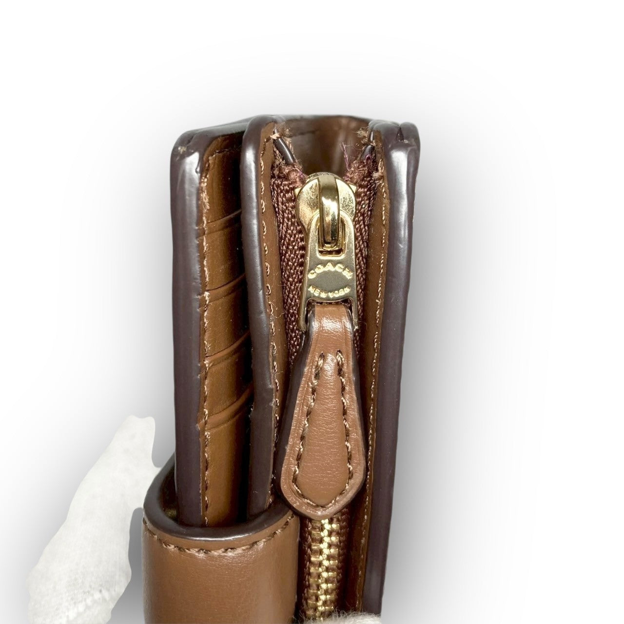 35 COACH コーチ 二つ折り財布 シグネチャー ブラウン