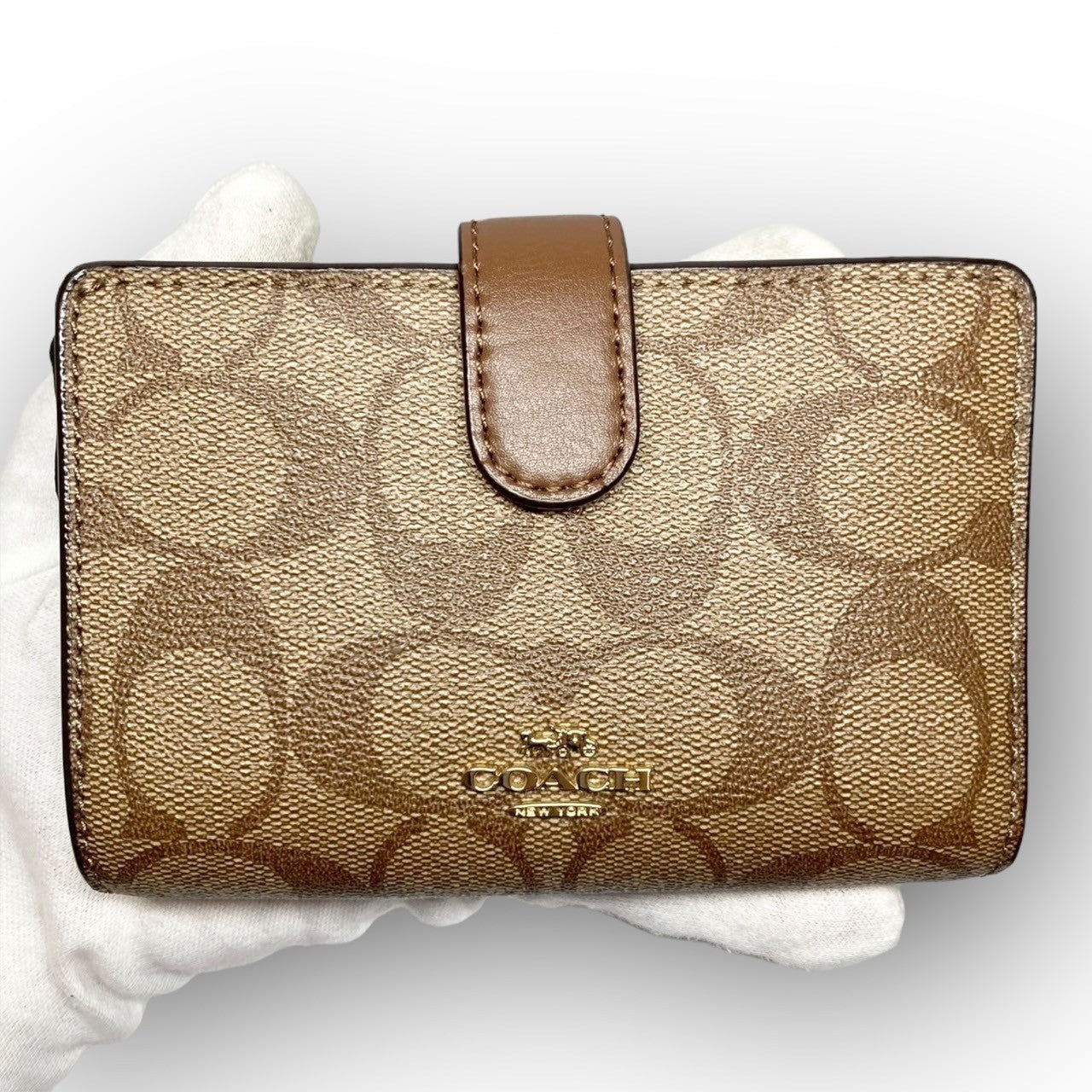 35 COACH コーチ 二つ折り財布 シグネチャー ブラウン