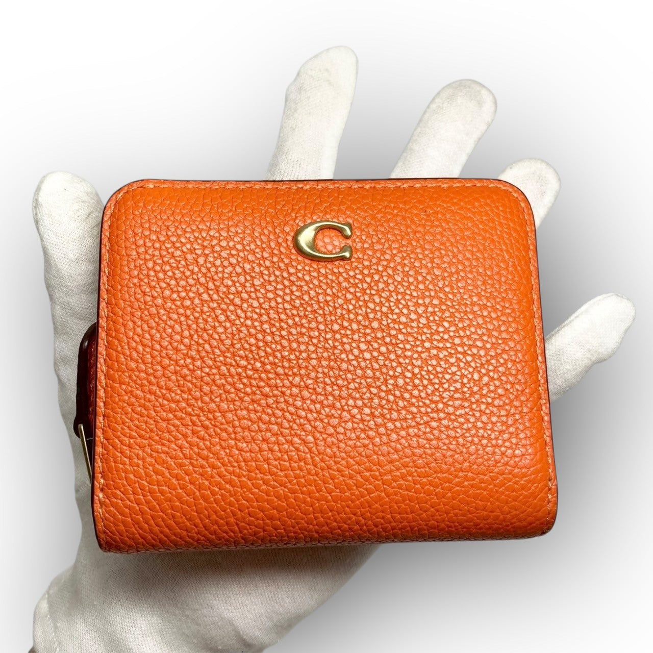 ３３ COACH コーチ 二つ折り財布 ミニ財布 オレンジ