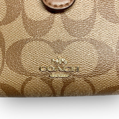 ３５ COACH コーチ 二つ折り財布 シグネチャー ブラウン
