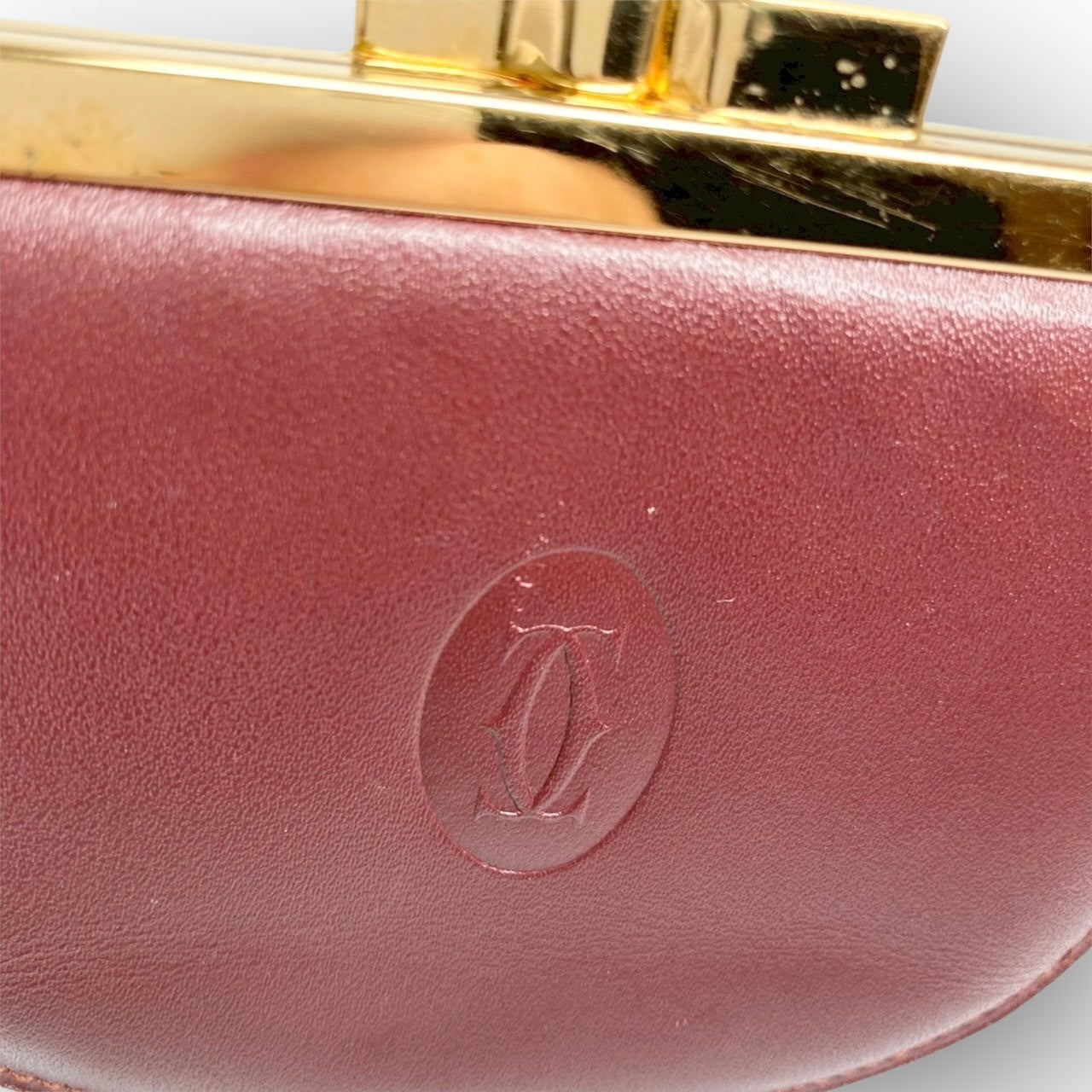 ３８ Cartier カルティエ コインケース がま口 ボルドー