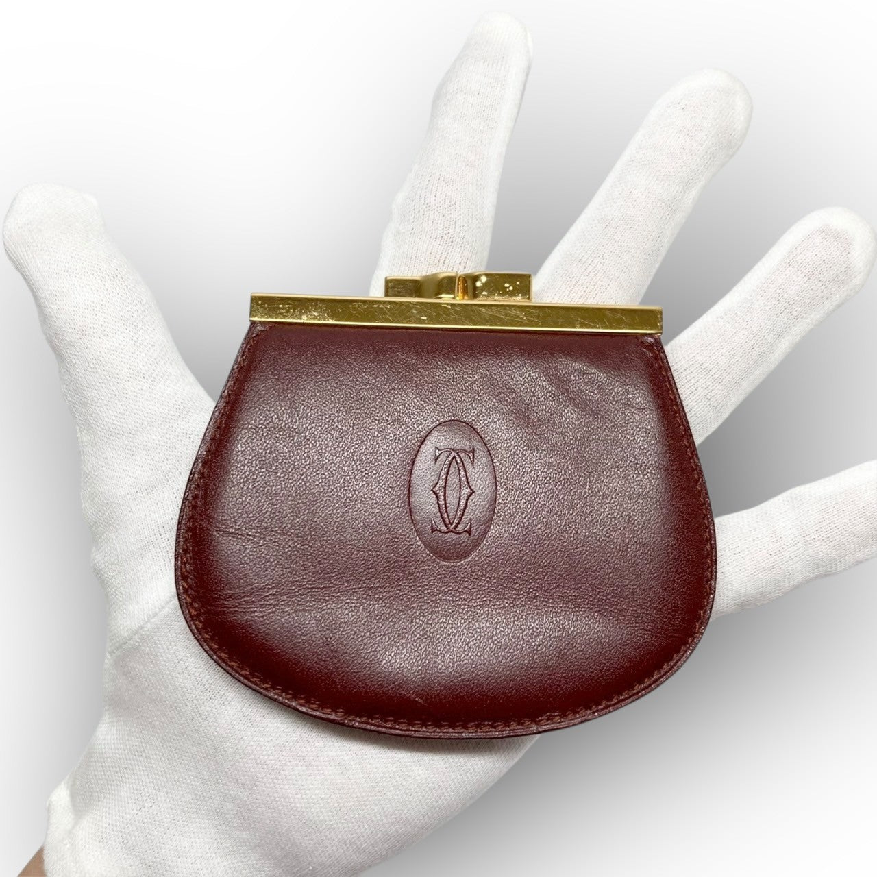 ３８ Cartier カルティエ コインケース がま口 ボルドー