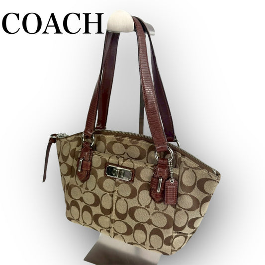 ８１ COACH コーチ ハンドバッグ ミニバッグ シグネチャー ブラウン